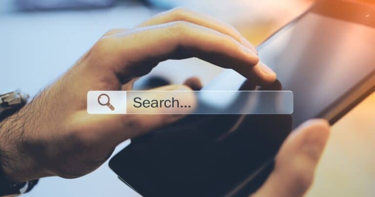 An image representing a person completing a search on their mobile phone.